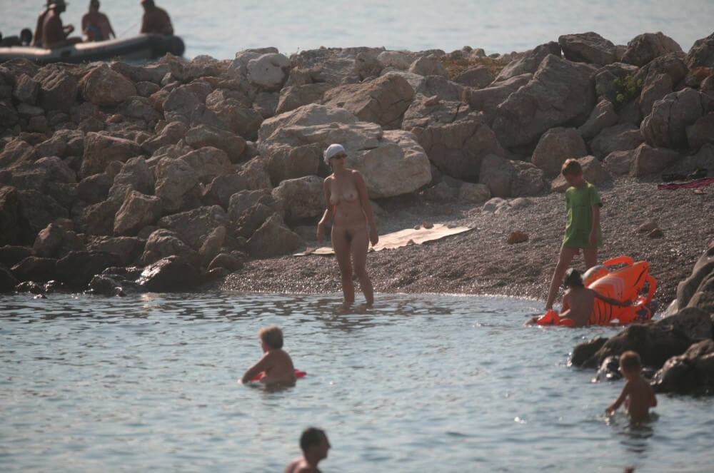 FKK cove pyramid in waters - Naturism is based on love for oneself and nature