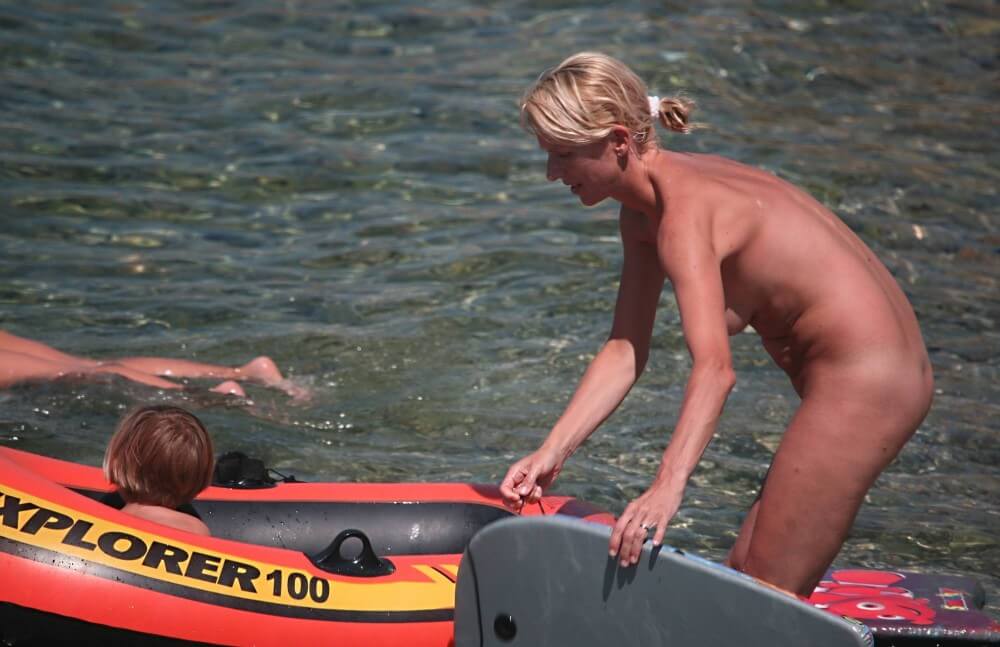 Red Boating for Two Nudists pics - The idea of self-acceptance and self-respect is important among naturists