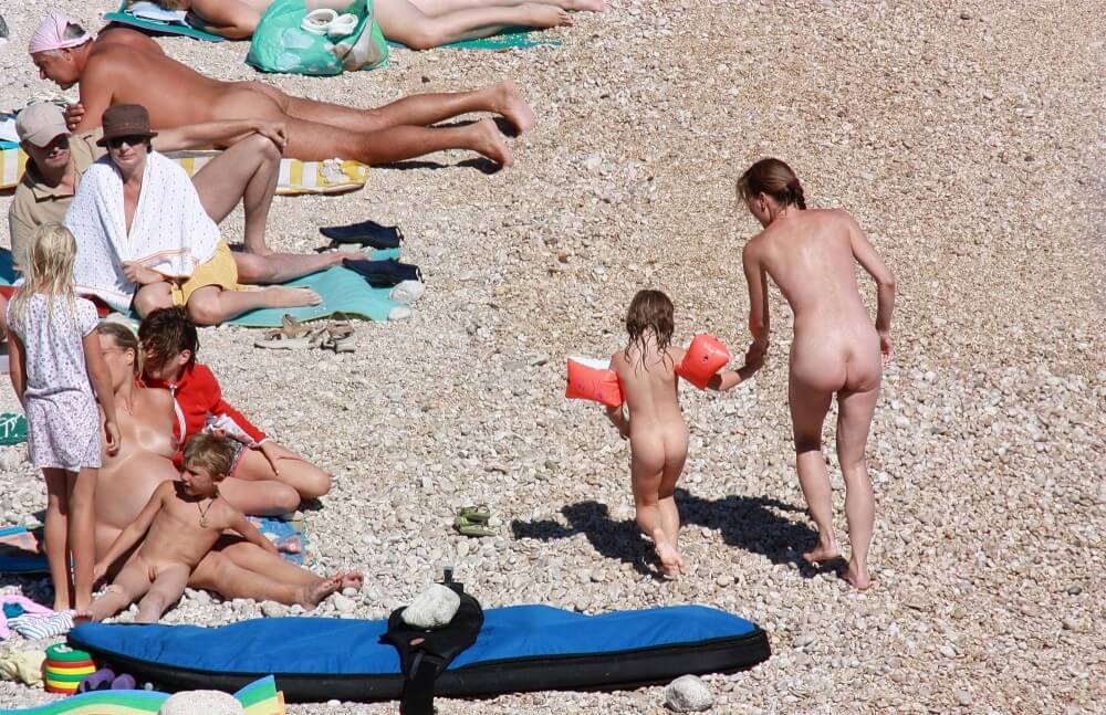 Orange Floaty Safety First Naturist pics - Nudity as a natural aspect of human life